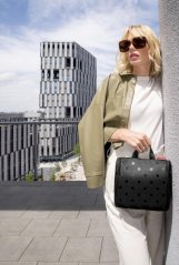 Toaletní taštička Reisenthel Toiletbag Glossy dots black WH7075